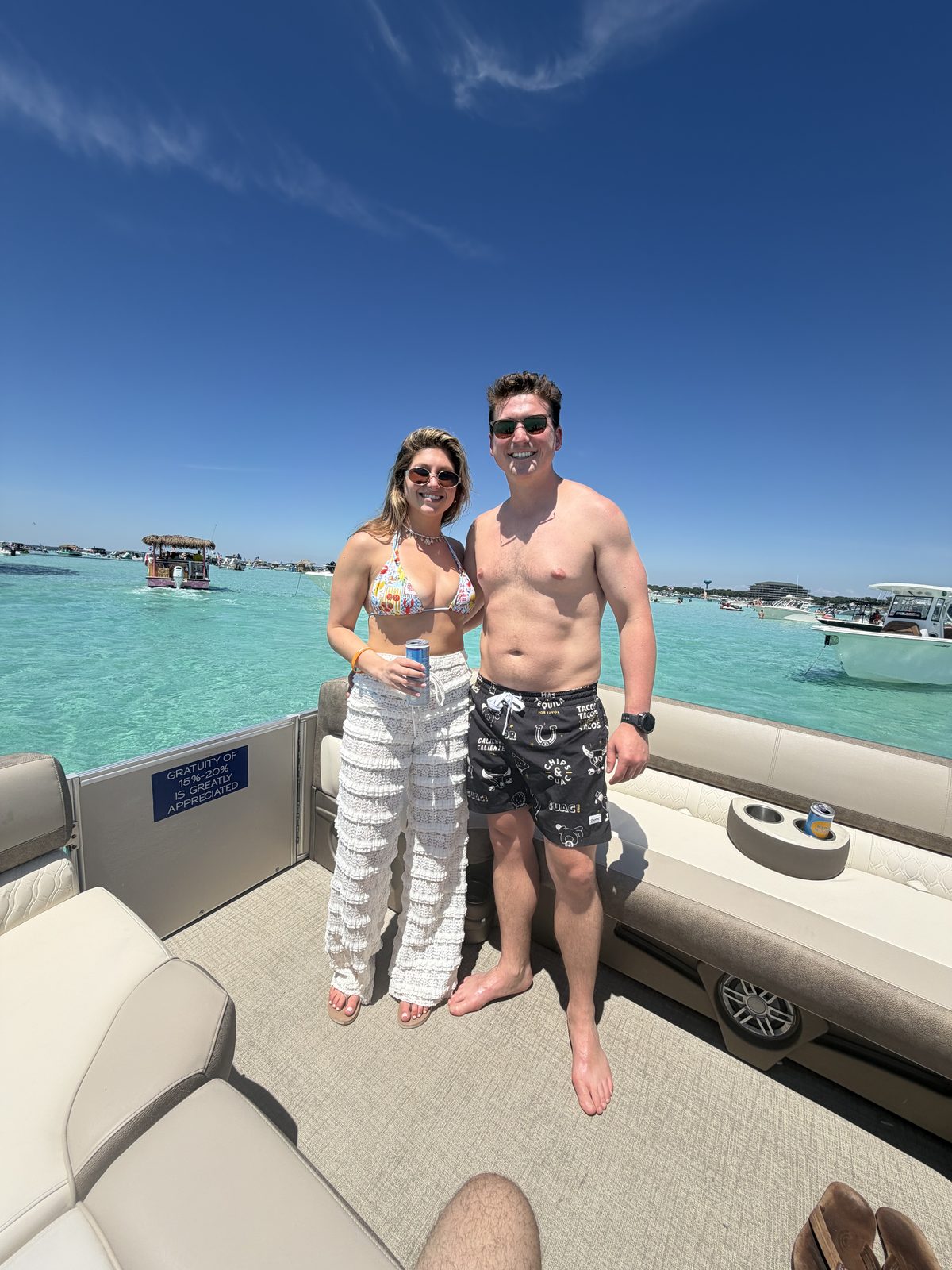 On a boat over turquoise water on a bright day