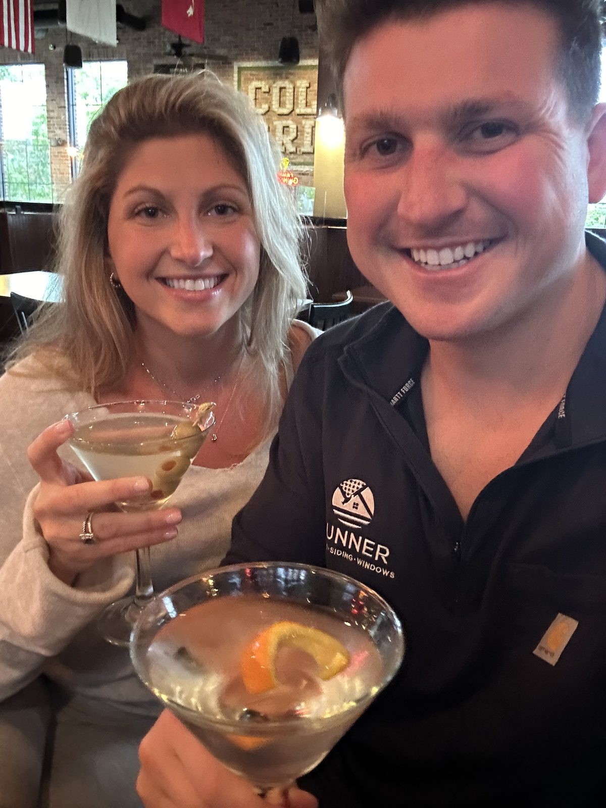 Selfie with martinis at a bar
